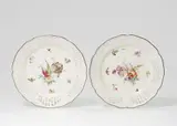 A pair of Berlin KPM porcelain dessert plates from a service for Prince Heinrich by Königliche Porzellanmanufaktur Berlin Kpm, sold May 2022