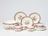 Items from a Berlin KPM porcelain tea service with putti by Königliche Porzellanmanufaktur Berlin Kpm, sold May 2022