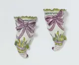 A pair of Berlin KPM porcelain cornucopia wall vases by Königliche Porzellanmanufaktur Berlin Kpm, sold May 2022
