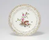 A Berlin KPM porcelain dessert plate from a service for Charlottenburg Palace by Königliche Porzellanmanufaktur Berlin Kpm, sold May 2022