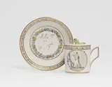 A Gotha porcelain cup and saucer with gilt monograms by Gothaer Porzellanfabrik, sold May 2022