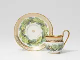 A Neoclassical Berlin KPM porcelain cup and saucer with oak wreaths by Königliche Porzellanmanufaktur Berlin Kpm, sold May 2022