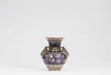 A Berlin KPM porcelain vase with rams' heads and raised enamel decor by Königliche Porzellanmanufaktur Berlin Kpm, offered May 2022