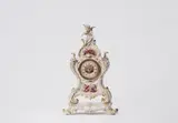 A rare Berlin KPM porcelain clock by Königliche Porzellanmanufaktur Berlin Kpm, offered May 2022