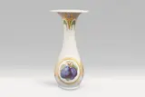 A narrow Berlin KPM porcelain vase with Jugendstil plum decor by Königliche Porzellanmanufaktur Berlin Kpm, sold May 2022