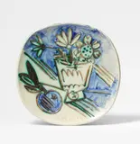 Pablo Picasso, Bouquet à la pomme, 1956, Ceramic plate. White clay, oxydized with paraffin in blue, green and black and glazed. With relief decor; ceramic, Madoura edition