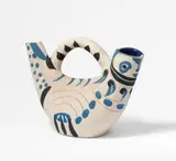 Pablo Picasso, Pichet Espagnole, 1954, Ceramic jug with handle. White clay with blue and black engobe painting, with incised decor, glazed inside; ceramic, Madoura edition