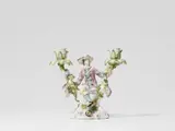 Meissen Royal Porcelain Manufactory, A Meissen porcelain candlestick with a gardener boy