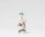 Meissen Royal Porcelain Manufactory, A Meissen porcelain figure of Harlequin with bagpipes