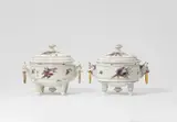 Jean-Baptiste Monnoyer, Two Hagenau porcelain tureens with bull's heads