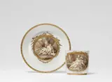 Meissen Royal Porcelain Manufactory, A Meissen porcelain cup and saucer with mythological scenes