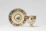 Meissen Royal Porcelain Manufactory, A Meissen porcelain cup and saucer with Ganymede