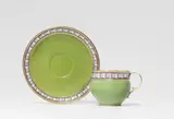 Meissen Royal Porcelain Manufactory, A Meissen porcelain cup and saucer with apple green ground