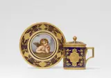 Meissen Royal Porcelain Manufactory, A Meissen porcelain cup and saucer with the angel from Raphael's Sixtine Madonna