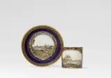 Meissen Royal Porcelain Manufactory, A Meissen porcelain cup with a view of Meissen and saucer with a view of Dresden
