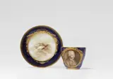 Meissen Royal Porcelain Manufactory, A Meissen porcelain cup and saucer with Jean-Jacques Rousseau