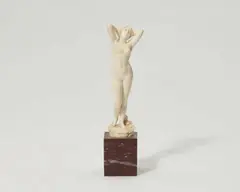 Ferdinand Preiss, An German carved ivory figure of a woman, Carved in the round on a red marble pedestal. The plinth engraved "F.Preiss". H 13.5, with base
