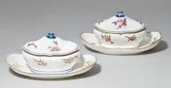 Sèvres, Two Sèvres soft-paste porcelain sugar boxes and covers with flowers