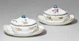 Sèvres, Two Sèvres soft-paste porcelain sugar boxes and covers with flowers