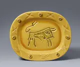 Taureau grave by Pablo Picasso, 1947, Oval ceramic dish. White clay with yellow and brown engobe painting, with incised and plastic decor, glazed; ceramic, Ma, sold Jun 2021