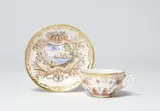 Johann Friedrich Metzsch, A Meissen porcelain cup and saucer with coloured bay leaf reliefs
