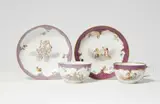 Andreas Oettner, Two Meissen porcelain cups and saucers with putto motifs