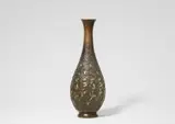 Jean Dunand, A “Genêts” brass vase by Jean Dunand, Embossed, burnished and gilt brass vase with the original tin inset for flowers. Engraved under the foot “JEAN DUNAND”. H