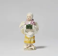 Wilhelm Caspar Wegely, A Wegely porcelain model of a girl with a muff as an allegory of winter