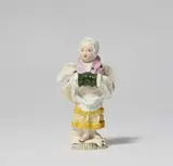 Wilhelm Caspar Wegely, A Wegely porcelain model of a girl with a muff as an allegory of winter
