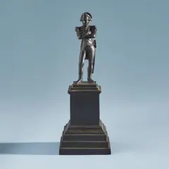 Wilhelm August Stilarsky, A small cast iron statuette of Napoléon I, Black patinated cast iron. Figure standing with arms crossed, wearing a tricorn. H