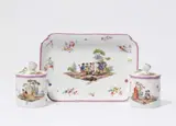 Andreas Oettner, A pair of Meissen porcelain beakers and covers with military scenes