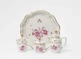 Fürstenberg, A Fürstenberg porcelain solitaire with flowers en camaieu