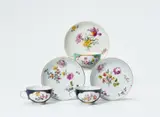 Meissen Royal Porcelain Manufactory, Three Meissen porcelain cups and saucers with coloured grounds