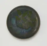Auguste Delaherche, An earthenware dish with holly decor