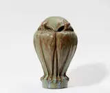 Eugène Emile Muller, A stoneware design "boule de rampe", Amorphic design with green gradient glaze. Unmarked. Chip to the lower rim, remnants of plaster mounting. H c