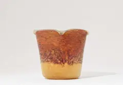 Daum Frères Nancy, A Daum Frères glass vase, Round faceted glass vase with yellow, orange and amethyst powder inclusions. Etched signature "DAUM NANCY" with cross of Lorraine. H