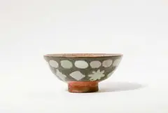 An earthenware dish with the head of a woman by René Buthaud by René Buthaud, offered Nov 2020