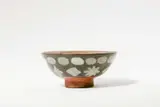 René Buthaud, An earthenware dish with the head of a woman by René Buthaud