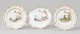 Nymphenburg, An oval Nymphenburg porcelain dish and two plates with green landscapes