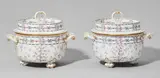 Nymphenburg, A pair of Nymphenburg porcelain ice pails with Atlas decor