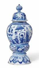 Gerhard Wolbeer, A Berlin faience vase and cover with blue chinoiserie decor