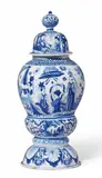 Gerhard Wolbeer, A Berlin faience vase and cover with blue chinoiserie decor