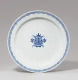 Cornelis Funcke, A large Berlin faience platter with a fanciful floral motif