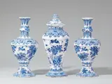 Cornelis Funcke, A rare set of Berlin faience vases with bird-on-rock motifs