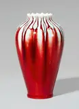 Hermann Seger, A Berlin KPM Seger porcelain vase with experimental glaze, Unidentified model with oxblood red and celadon green glaze. Blue sceptre mark with Sgr.P above a cancellation, incised 3425. M. H