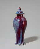 Hermann Seger, A Berlin KPM porcelain vase and cover with an experimental glaze, Unidentified model with original lid. With a dribble glaze in oxblood red and plum. Blue sceptre mark with Sgr.P., incised M and 40. H
