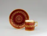A Vienna porcelain cup and saucer with gilt tendrils by Imperial Manufactory directed by Konrad von Sorgenthal Vienna, sold May 2020