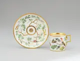Imperial Manufactory Vienna, A Vienna porcelain cup and saucer with Continental birds