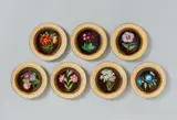 Imperial Manufactory Vienna, Seven Vienna porcelain dessert plates with botanical motifs