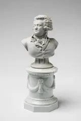 Fürstenberg, A Fürstenberg porcelain bust of the Marquis de Mirabeau, A finely wrought model formed bust on a separate glazed base. Impressed horse mark and W with blue F mark, impressed W and incised N:1. H